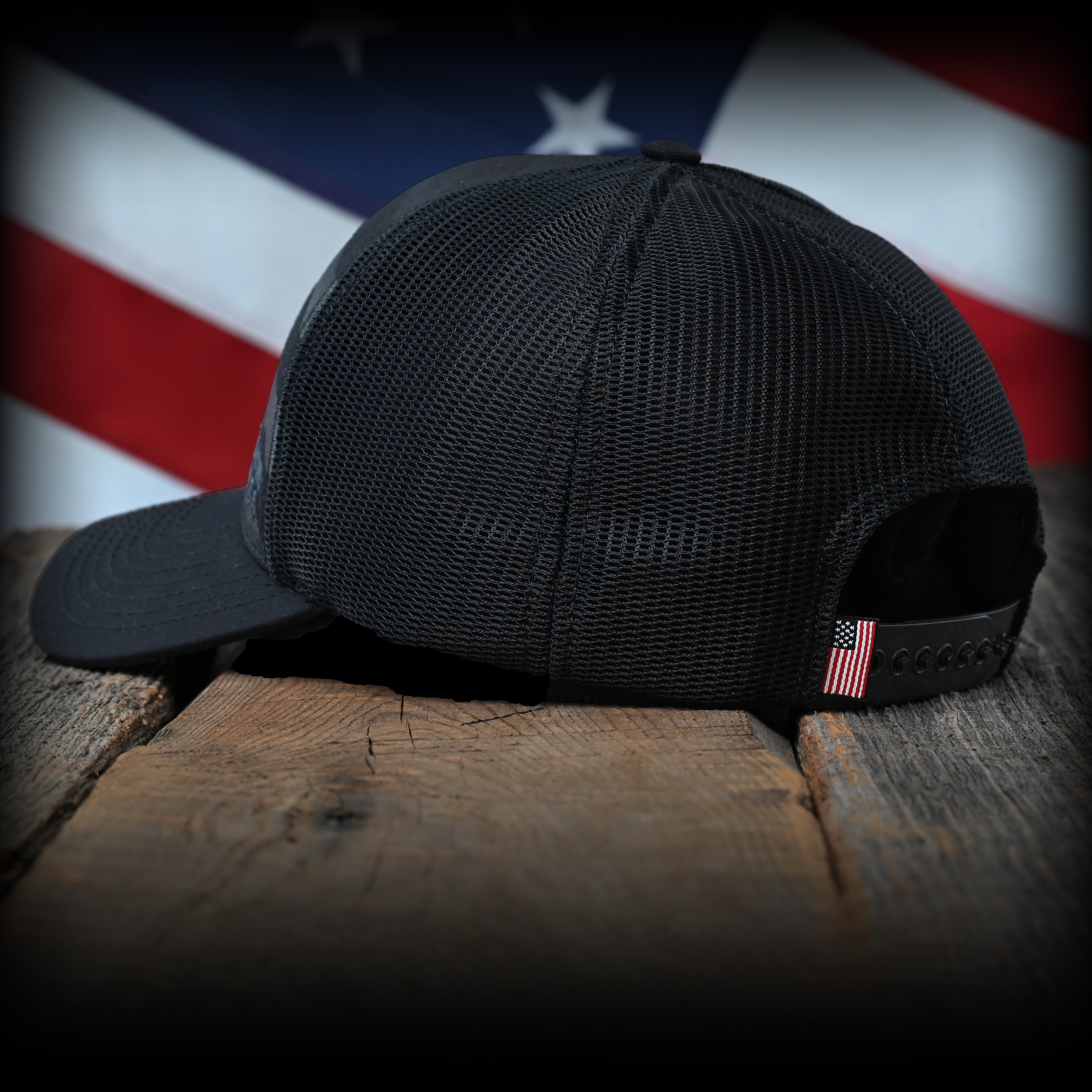Blacked Out Debossed American Flag Trucker Hat