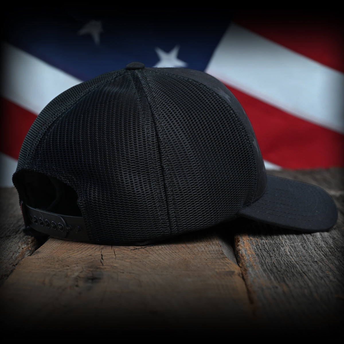 Blacked Out Debossed American Flag Trucker Hat