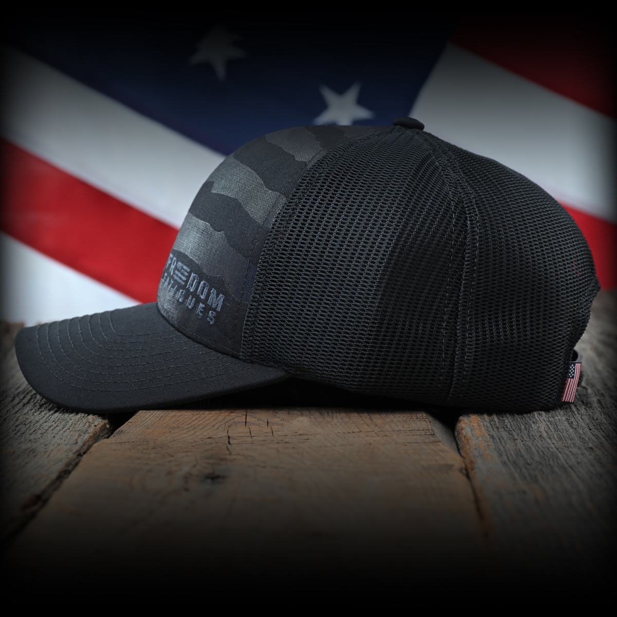 Blacked Out Debossed American Flag Trucker Hat