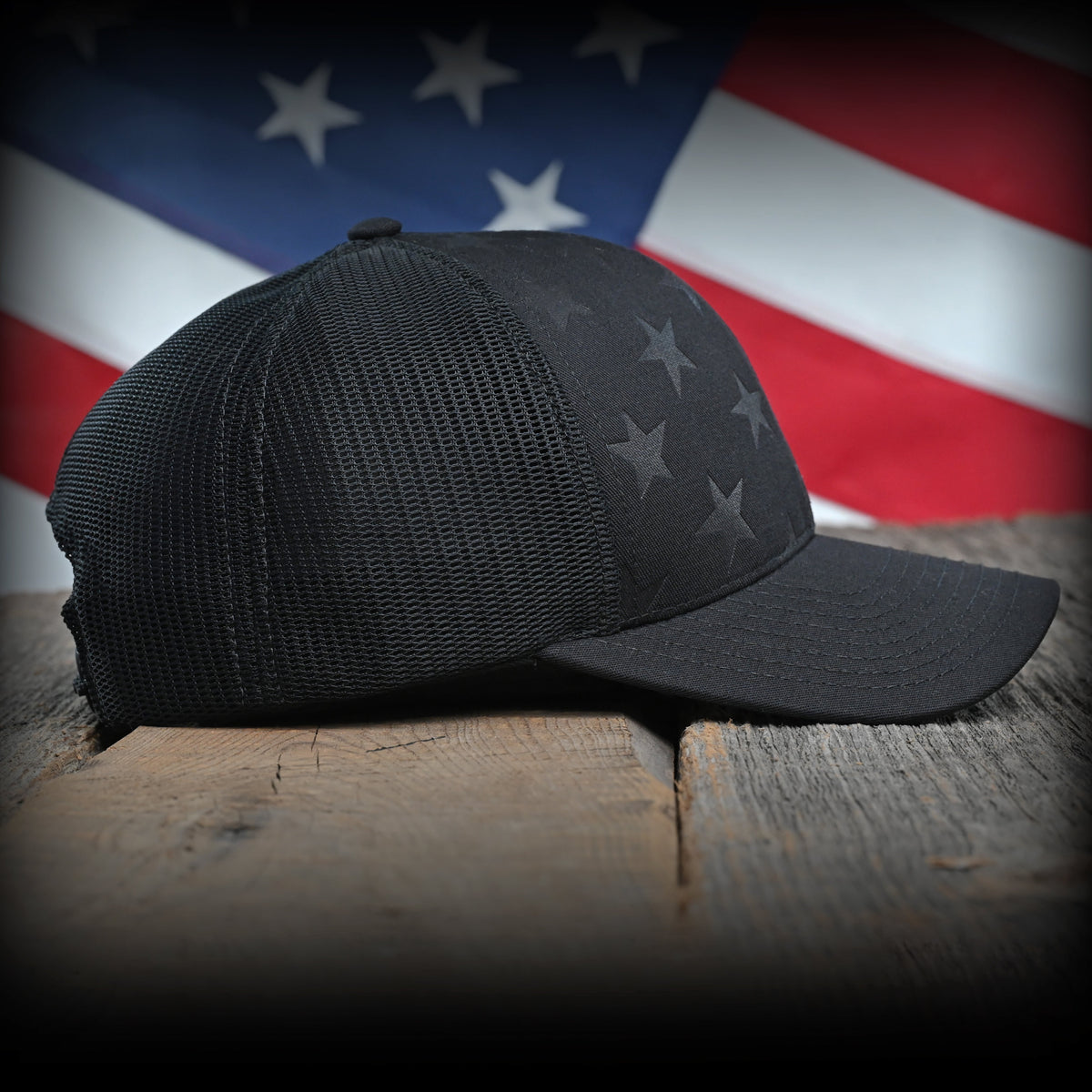 Blacked Out Debossed American Flag Trucker Hat