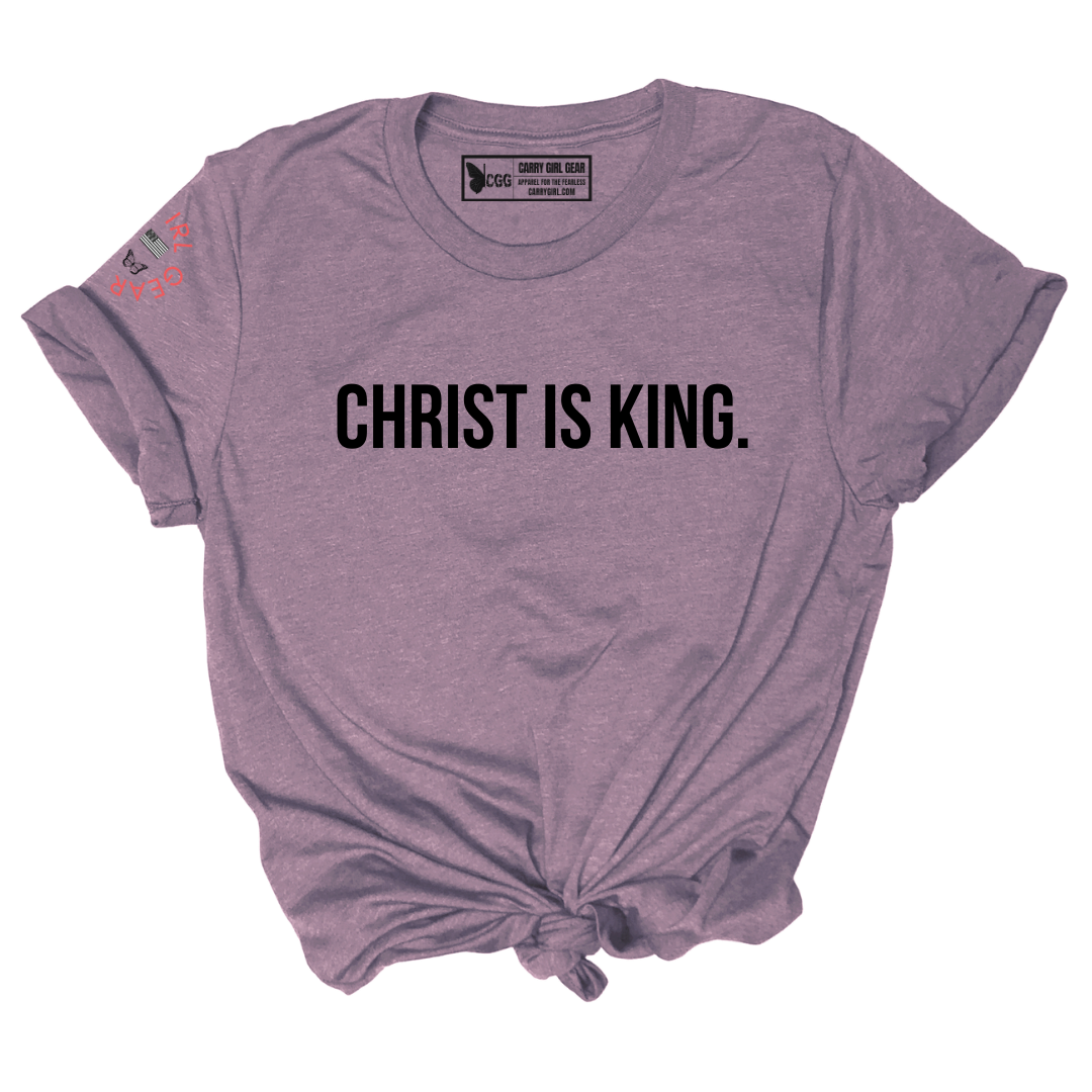 Purple t-shirt with 'CHRIST IS KING.' text on a white background