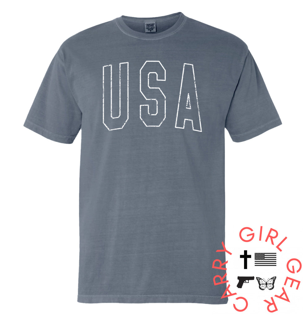 USA Collegiate Solid White (Front) Comfort Colors Tee / Blue Jean / S NC - Apparel
